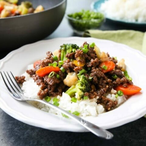 This cheap and easy Korean Beef recipe is made with ground beef instead of flank steak. It's simmered in a simple, yet flavorful sauce with added vegetables for a well-rounded meal. Serve with rice, and you've got a delicious dinner ready in 20 minutes or less!