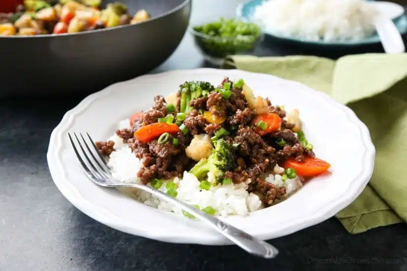 This cheap and easy Korean Beef recipe is made with ground beef instead of flank steak. It's simmered in a simple, yet flavorful sauce with added vegetables for a well-rounded meal. Serve with rice, and you've got a delicious dinner ready in 20 minutes or less!