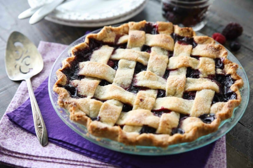 This Mixed Berry Pie uses a frozen blend of raspberries, blackberries, and blueberries which is perfect when fresh berries are out of season. No need to cook the filling ahead of time. Simply fill and bake. Enjoy this pie for the holidays or any day of the year!