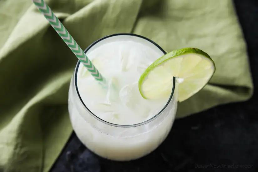 Brazilian Lemonade is actually a creamy limeade that is perfectly sweet and slightly tangy. The secret ingredient that makes it creamy will have you pouring glass after glass of this refreshing drink. Perfect for hot summer days, parties, and potlucks!