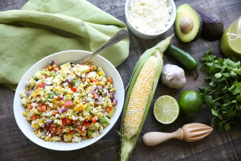 This summer Corn Salad with Queso Fresco is loaded with grilled corn, crisp onions and peppers, and creamy avocado, all topped with a homemade cilantro lime vinaigrette and generous helping of delicious queso fresco. 