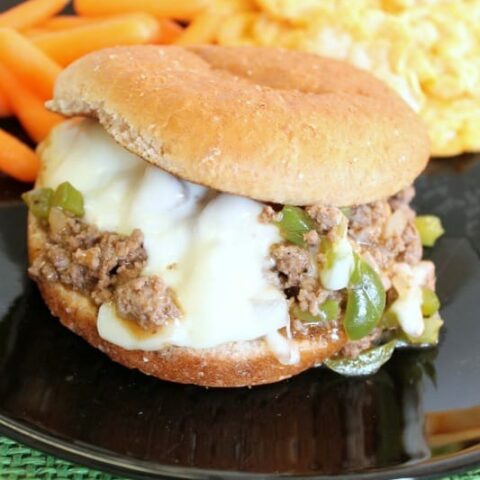 These Philly Cheesesteak Sloppy Joes have your favorite philly ingredients of peppers, onions, and melty cheese wrapped up in a beefy sloppy joe sandwich!