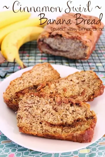 Labeled image of cinnamon swirl banana bread with a few slices on a plate.