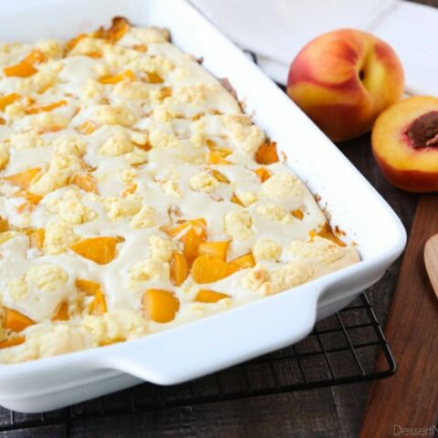 Peach cobbler meets cheesecake in this delicious dessert duo! An easy and unique twist from a traditional peach cobbler. There's cake mixture on bottom and on top, with peaches and cheesecake in-between.