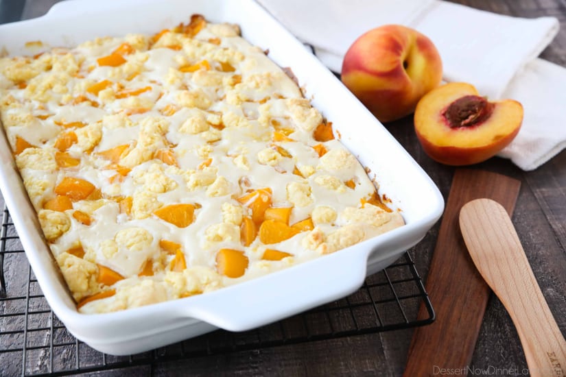 Peach cobbler meets cheesecake in this delicious dessert duo! An easy and unique twist from a traditional peach cobbler. There's cake mixture on bottom and on top, with peaches and cheesecake in-between.