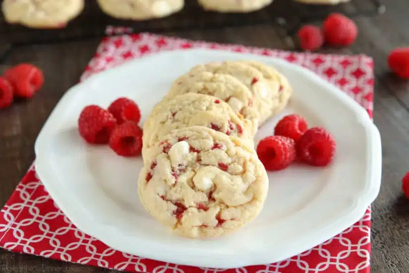 Raspberry Cheesecake Cookies are soft, chewy, and fruity! The best part is that they are made with a muffin mix which makes it a super easy dessert!