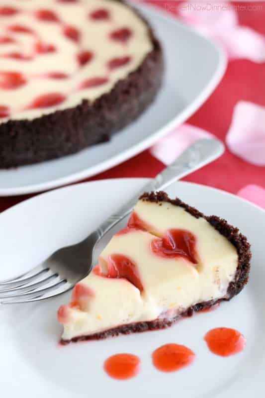 Slice of cheesecake with hearts.