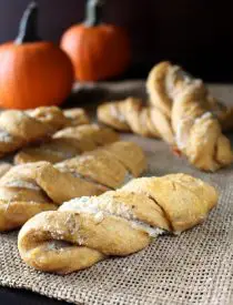 Savory Pumpkin Twists - Soft, moist yeast rolls featuring savory pumpkin flavors