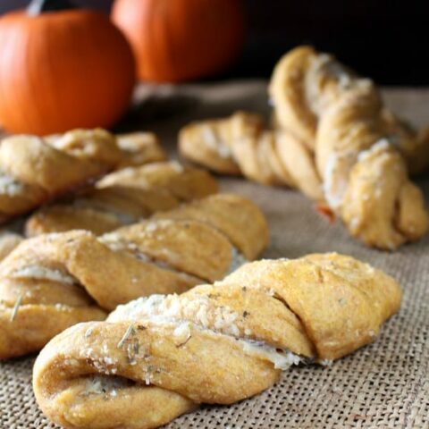 Savory Pumpkin Twists - Soft, moist yeast rolls featuring savory pumpkin flavors