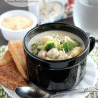 Chicken, broccoli florets, and noodles come together in this easy, creamy, garlic and parmesan alfredo broth. From DessertNowDinnerLater.com