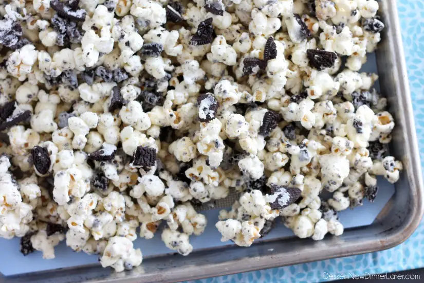 Cookies and Cream Popcorn - white chocolate and Oreos come together to flavor this air popped corn! From DessertNowDinnerLater.com