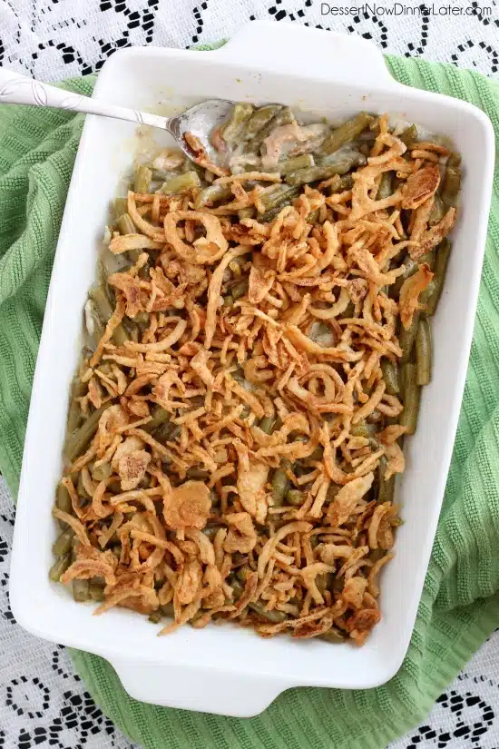 This Green Bean Casserole is made with a quick and easy homemade sauce - no cream soup needed! From DessertNowDinnerLater.com