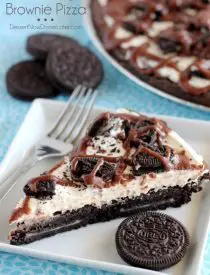 Oreo Fudge Brownie Pizza – These brownies are for the Oreo lovers! There are plenty of Oreo’s inside and out of this dessert pizza, topped with a marshmallow fluff frosting and drizzled in fudge sauce. From DessertNowDinnerLater.com