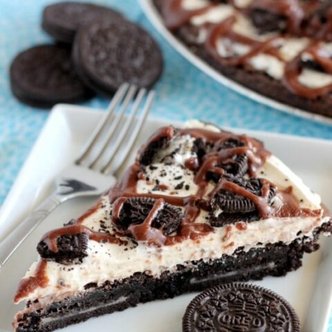 Oreo Fudge Brownie Pizza – These brownies are for the Oreo lovers! There are plenty of Oreo’s inside and out of this dessert pizza, topped with a marshmallow fluff frosting and drizzled in fudge sauce. From DessertNowDinnerLater.com