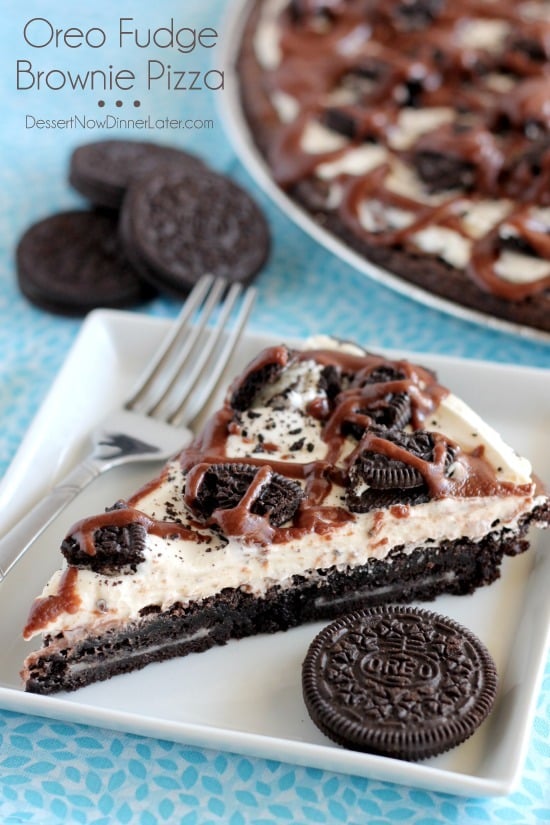 Oreo Fudge Brownie Pizza – These brownies are for the Oreo lovers! There are plenty of Oreo’s inside and out of this dessert pizza, topped with a marshmallow fluff frosting and drizzled in fudge sauce. From DessertNowDinnerLater.com