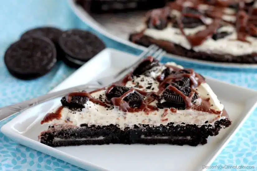 Oreo Fudge Brownie Pizza – These brownies are for the Oreo lovers! There are plenty of Oreo’s inside and out of this dessert pizza, topped with a marshmallow fluff frosting and drizzled in fudge sauce. From DessertNowDinnerLater.com