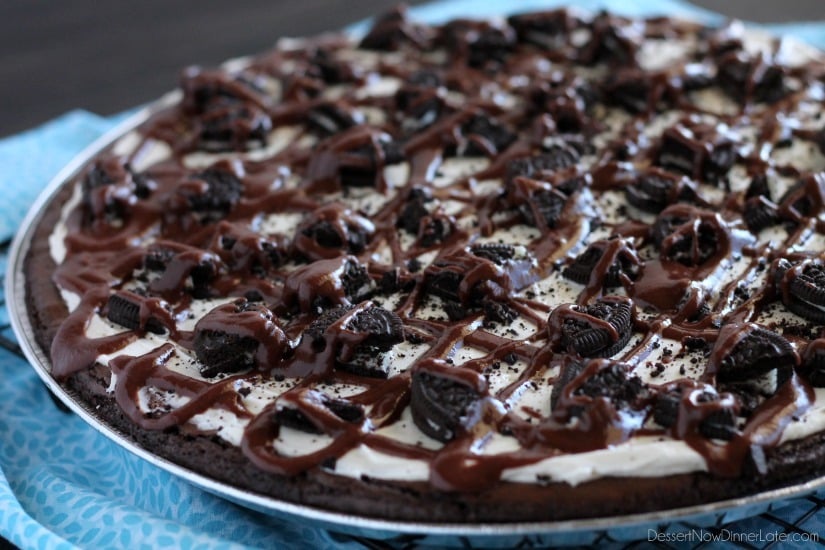 Oreo Fudge Brownie Pizza – These brownies are for the Oreo lovers! There are plenty of Oreo’s inside and out of this dessert pizza, topped with a marshmallow fluff frosting and drizzled in fudge sauce. From DessertNowDinnerLater.com