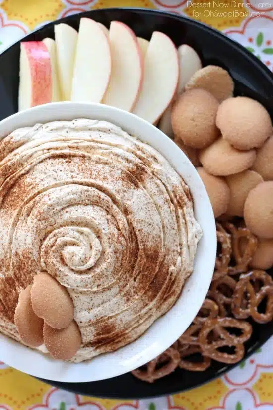 Pumpkin Cheesecake Dip is super simple to make and is great with apples, vanilla wafers, pretzels and more! From DessertNowDinnerLater.com