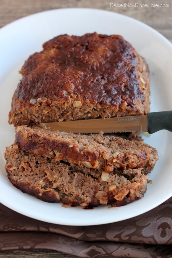 Steak Lovers' Meatloaf - A1 steak sauce, garlic, and onions on the inside, with more steak sauce slathered on the outside, makes this meatloaf both moist and delicious! From DessertNowDinnerLater.com