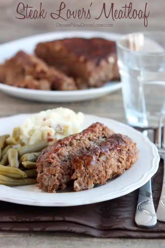 Steak Lovers' Meatloaf - A1 steak sauce, garlic, and onions on the inside, with more steak sauce slathered on the outside, makes this meatloaf both moist and delicious! From DessertNowDinnerLater.com