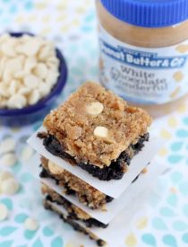 White Chocolate Peanut Butter Brookies - a layer of brownies topped with a layer of peanut butter white chocolate chip cookies. Combined they are delicious brookies! From DessertNowDinnerLater.com