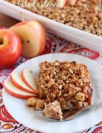 Apple Cinnamon Baked Oatmeal - old fashioned oats, agave, and apples are just a few of the delicious ingredients used in this lighter baked oatmeal. From DessertNowDinnerLater.com