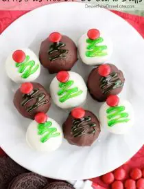These traditionally made OREO Cookie Balls are decorated with green gel and a red candy coated chocolate piece for a festive Christmas Tree treat! From DessertNowDinnerLater.com
