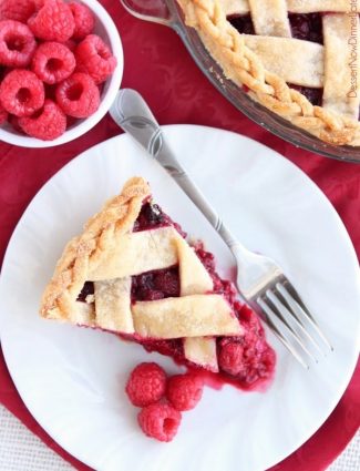This Raspberry Pie can be made with frozen or fresh raspberries for a vibrant and delicious fruit pie! From DessertNowDinnerLater.com
