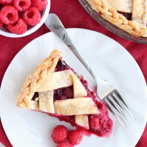 This Raspberry Pie can be made with frozen or fresh raspberries for a vibrant and delicious fruit pie! From DessertNowDinnerLater.com