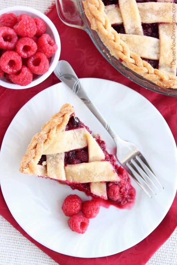 This Raspberry Pie can be made with frozen or fresh raspberries for a vibrant and delicious fruit pie! From DessertNowDinnerLater.com