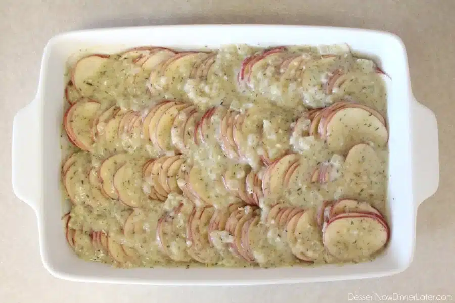 Tuscan Scalloped Potatoes - pour Tuscan cream sauce over potatoes.