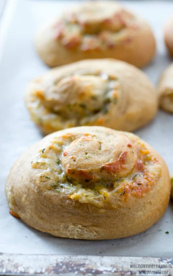 These soft dinner rolls are stuffed full of melty cheesy and lots of garlic flavor.---they're the perfect side-kick to a hot bowl of soup! 