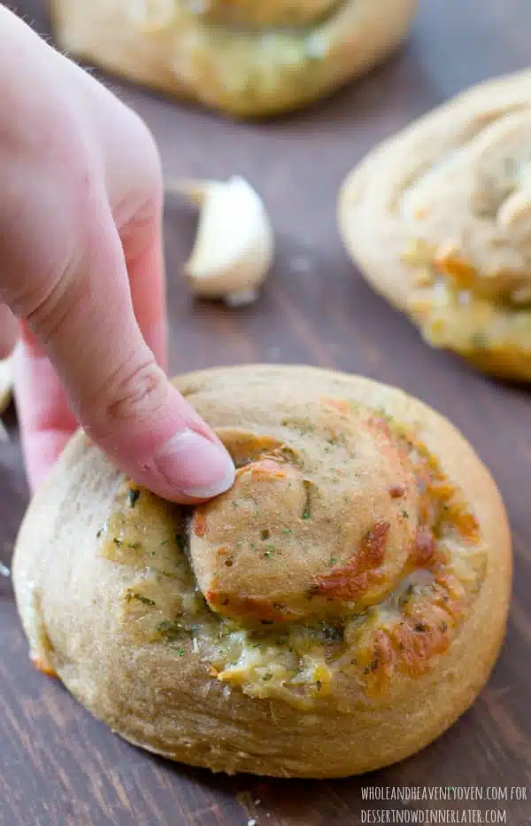 These soft dinner rolls are stuffed full of melty cheesy and lots of garlic flavor.---they're the perfect side-kick to a hot bowl of soup! 