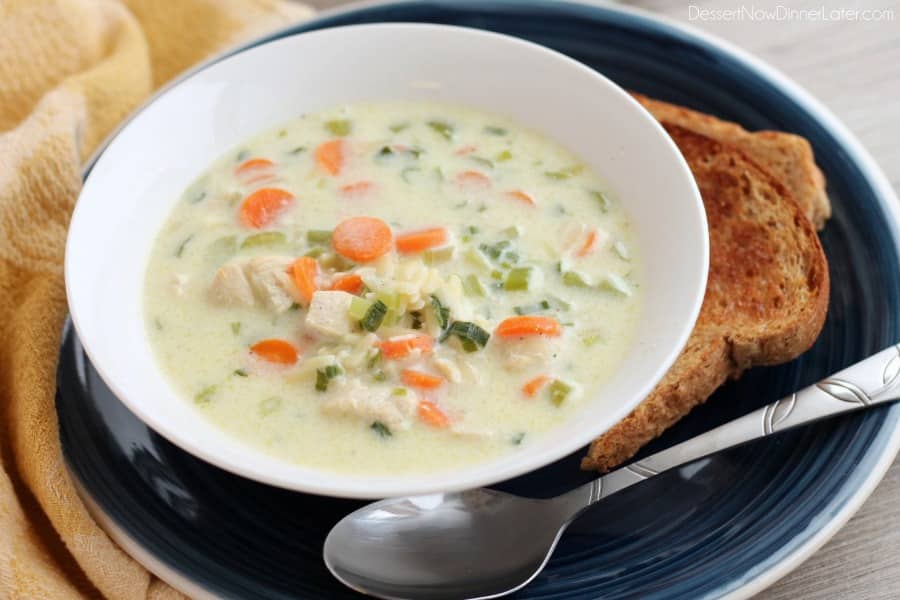 This Chicken Orzo Soup is full of carrots, green onions, celery, and tender chunks of chicken, in a creamy broth with orzo pasta throughout. From DessertNowDinnerLater.com