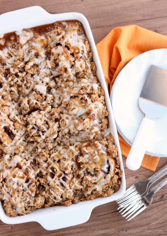 Cinnamon Pumpkin Crumble - frozen cinnamon rolls smothered in pumpkin pie mix, spices, and a crispy-crunchy streusel, then baked to perfection and served with a drizzle of cream cheese frosting and caramel!