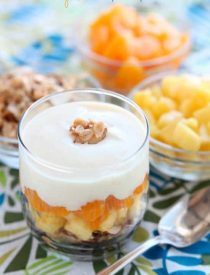 Enjoy this Dairy-Free Tropical Parfait with a homemade honey almond coconut granola base, layers of pineapple and mandarin oranges, all topped with a creamy-textured, smooth Dairy-Free Yogurt Alternative from Silk!