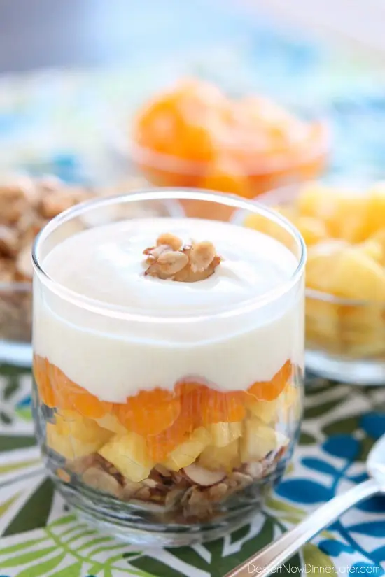 Enjoy this Dairy-Free Tropical Parfait with a homemade honey almond coconut granola base, layers of pineapple and mandarin oranges, all topped with a creamy-textured, smooth Dairy-Free Yogurt Alternative from Silk!