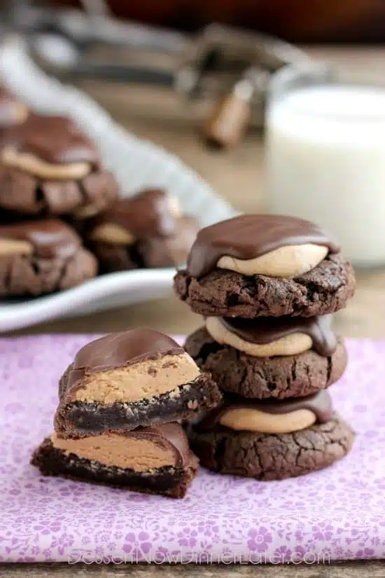 Buckeye Cookies - a chocolate brownie cookie base, topped with peanut butter balls, all covered in chocolate! These are insanely delicious!