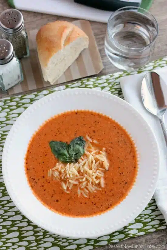 This Copycat Zupas Tomato Basil Soup is spot on! With fresh made basil pesto, whole tomatoes, and sauteed vegetables, cooked slow, and pureed smooth. This is one soup you’ll love to create at home served with al dente orzo pasta!