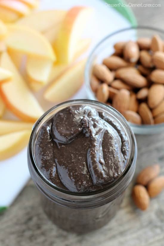 This Dark Chocolate Honey Almond Butter is made with pure ingredients for a healthy homemade spread great on toast, as a dip for apples and bananas, or eaten straight from the spoon! (Bonus! It's Gluten Free, Paleo, and can easily be turned into Vegan.)