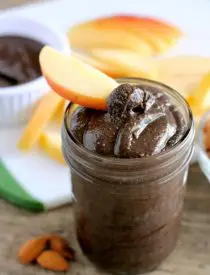 This Dark Chocolate Honey Almond Butter is made with pure ingredients for a healthy homemade spread great on toast, as a dip for apples and bananas, or eaten straight from the spoon! (Bonus! It's Gluten Free, Paleo, and can easily be turned into Vegan.)