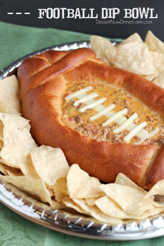 This Football Dip Bowl is made with a frozen whole wheat dough that is shaped into a football with a place to hold your favorite queso dip! Make laces with cut up string cheese and you have a football themed party food! (Step-by-step photos included.)