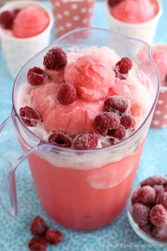 This Pink Sherbet Punch is only 2 ingredients for a fizzy, frothy drink! Add frozen fruit for a garnish and you've got a party punch great for baby showers, Valentine's Day, or summer gatherings!