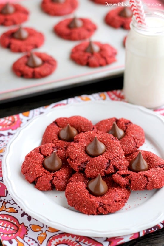 Red velvet blossom cookies with Hershey's chocolate kisses in the center.