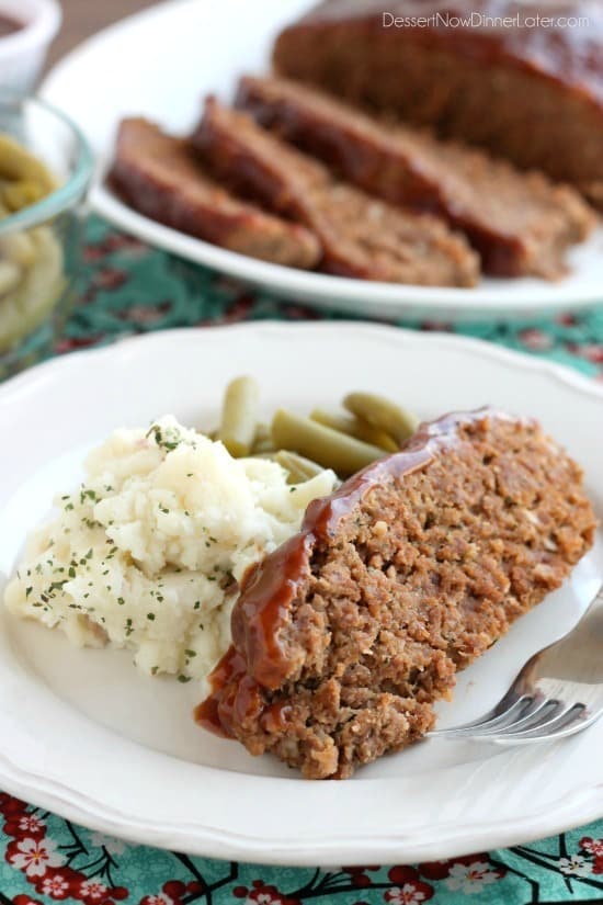 This Slow Cooker Meatloaf has a delicious savory-sweet brown sugar and balsamic glaze on top, and is cooked on a sheet of parchment paper that easily lifts the meatloaf out of the slow cooker when it's done cooking. 