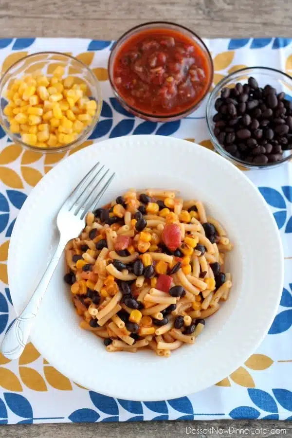 Need an easy and quick dinner idea?  Grab a box of mac and cheese and a few other pantry ingredients to create this bold Southwestern Mac and Cheese the whole family will enjoy!