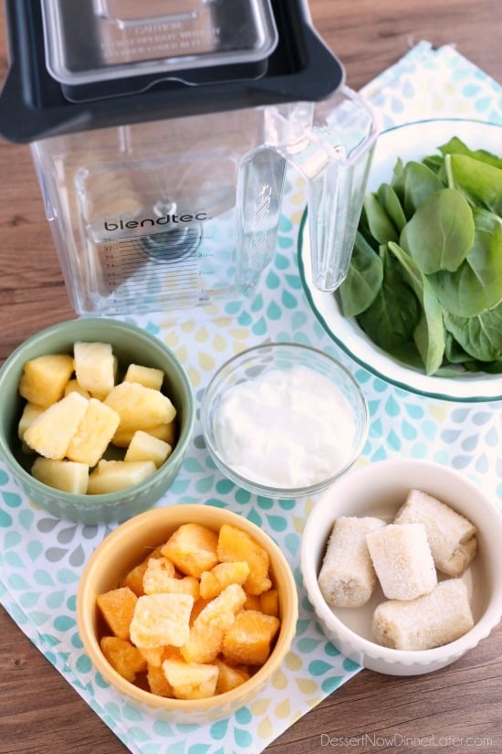 This Tropical Green Smoothie uses tender spinach leaves, plain non-fat greek yogurt, and frozen fruit for a naturally sweet smoothie that's great for breakfast or a snack!