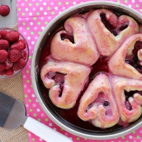 These heart shaped raspberry rolls are the perfect sweet treat or breakfast idea for your sweetheart this Valentine's Day!