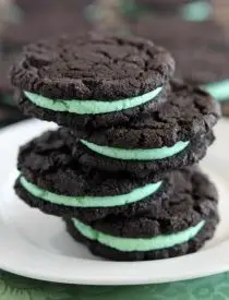 These Homemade Mint Oreos have a simple mint buttercream sandwiched between crisp, yet tender, dark chocolate cookies!