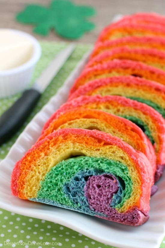 Rainbow Bread - Rhodes frozen dough is kneaded into 6 bright colors and rolled into a fun rainbow loaf (step-by-step photo instructions included). The perfect bread to eat with butter for dinner or use for breakfast french toast on St. Patrick's Day!